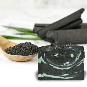 Purifying soap with activated charcoal and tea tree essential oil